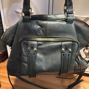 Blue Shoulder Bag with Gold Hardware and Slouchy Shape